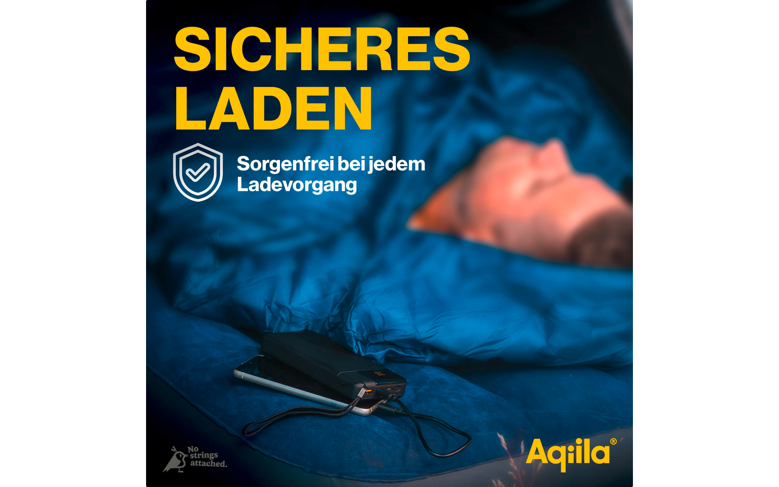 Smartphone ligt op een blauwe deken met de tekst Veilig Opladen