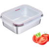 Boîte rectangulaire en acier inoxydable avec couvercle plastique transparent, joint rouge et fermetures à clips ; à côté tomates entières et tranchées avec tiges vertes et feuilles