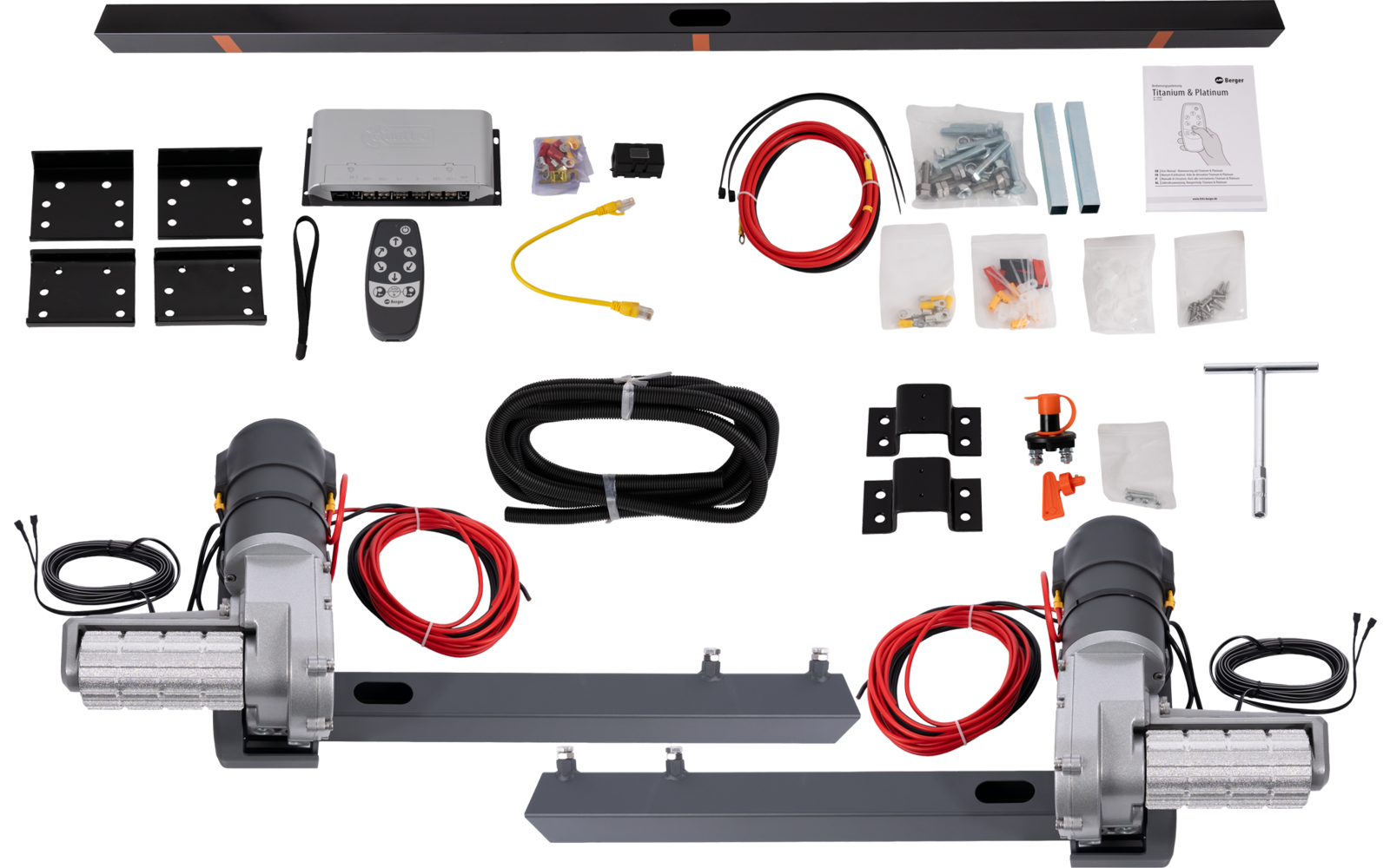 Dos rodillos plateados con carcasa negra, cables rojo y negro, larga barra metálica negra en la parte superior, mando a distancia, varias piezas metálicas negras y plateadas, tornillos en pequeñas bolsas de plástico, manual de instrucciones