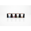 Four shot glasses in black packaging, each with a colored base (blue, red, green, orange) and an orange‑slice motif on top