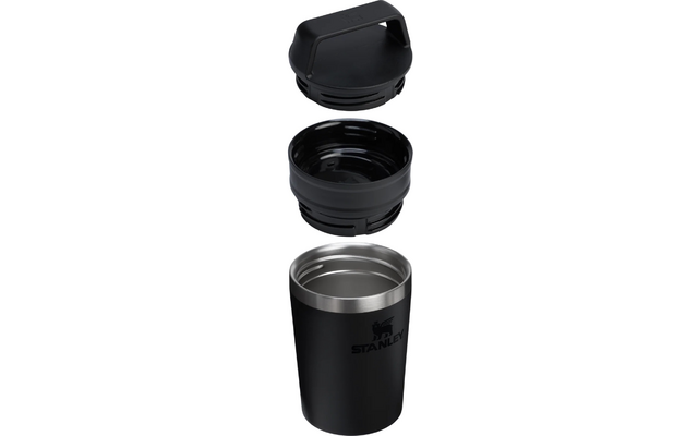 Drei getrennte Teile: oben ein schwarzes, rechteckiges Griffstück mit abgerundeten Kanten; in der Mitte eine runde schwarze Plastikkomponente mit innenliegenden Rillen; unten ein schwarzes, zylindrisches Metallgefäß mit silberner Innenfläche und aufg