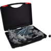 Open black plastic case with red latches, several long zinc-plated screws with hex heads and white plastic anchors, single nut beside the case