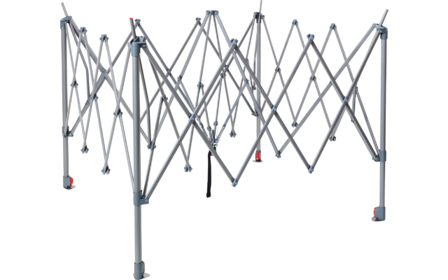 Gekreuztes Metallgestell mit scherenförmigen Streben und mehreren senkrechten Beinen, graue Rohre, rote Abdeckungen an einigen Verbindungen und ein schwarzes Bedienelement in der Mitte