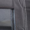 Close-up of dark fabric with white stitching and adjacent dark mesh fabric with a visible seam edge