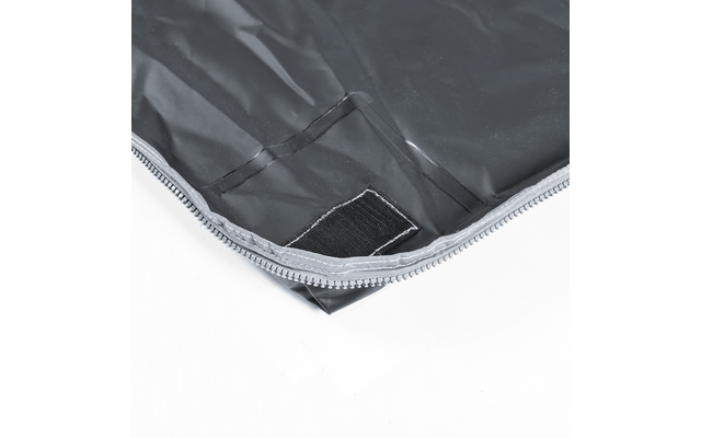 Close-up of a gray zippered pouch with an open zipper and visible Velcro inside