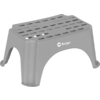 Grauer Plastiktritt mit rechteckigen Löchern und vier Beinen