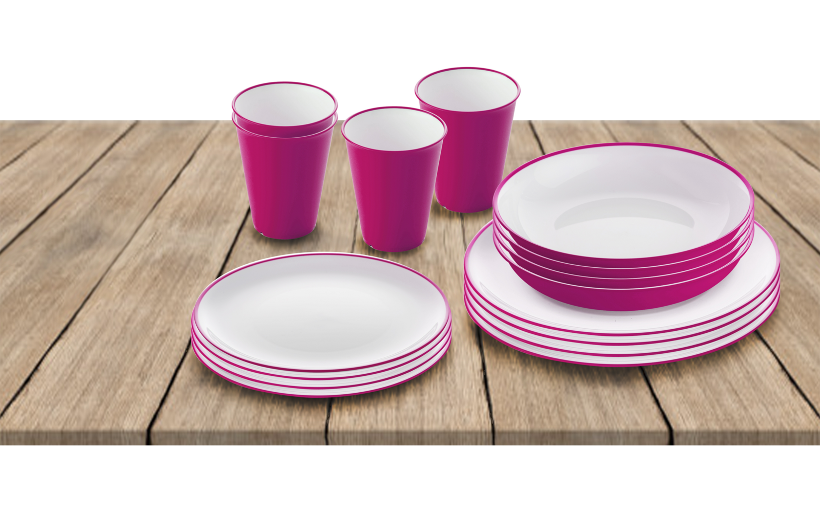 Meerdere roze-witte borden en bekers op een houten tafel