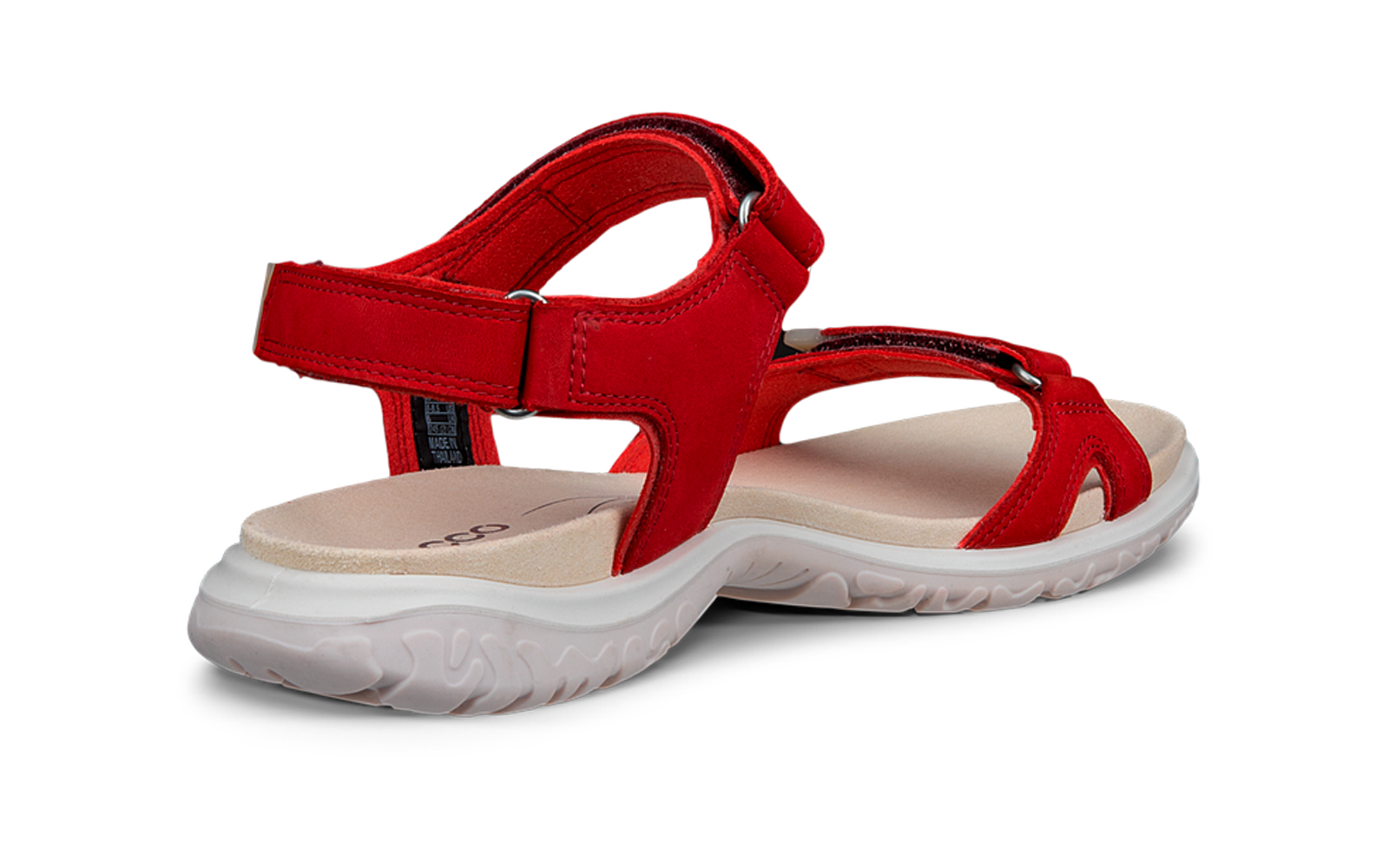 Rode sandaal met klittenbandsluitingen, lichtbeige gevoerd voetbed en witte loopzool met profiel, zijaanzicht op witte achtergrond