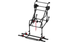 Zwarte metalen fietsendrager met twee parallelle rails, meerdere rode riemen en kunststofklemmen