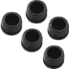 Five black round rubber bushings with cylindrical openings on a white background