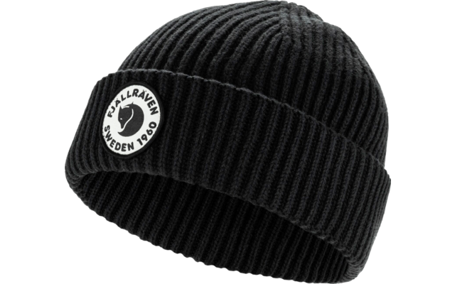 Bonnet en tricot noir avec revers et logo rond blanc sur le bord