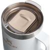 Edelstahl-Reisebecher mit transparentem Kunststoffdeckel, beige Schiebedeckel, weißer Außenfläche, Metallrand und sichtbarem Logo