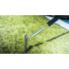 Metal stake driven into dry soil