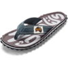 Single flip-flop with teal fabric strap, brown footbed with white pattern, visible 'Gumbies' label on the strap, and black textured sole