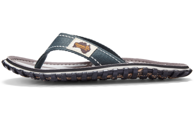 A single dark blue flip‑flop with a V-shaped fabric strap, lighter insole, textured black rubber sole, and a small rectangular label on the strap