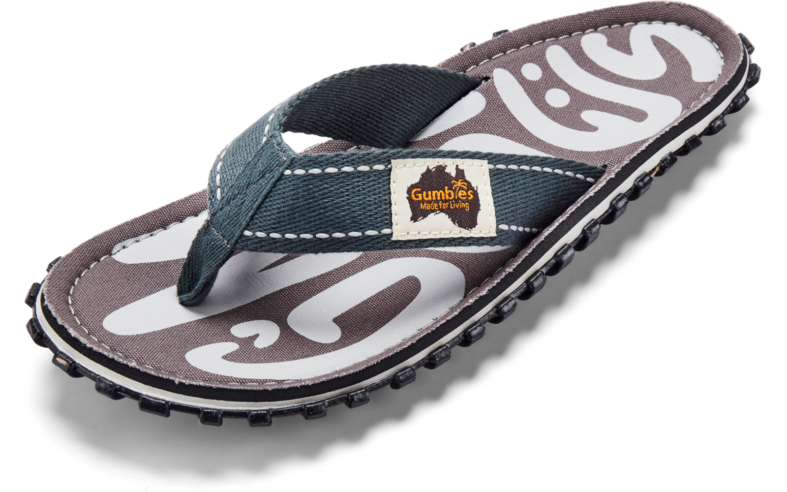 Single flip-flop with teal fabric strap, brown footbed with white pattern, visible 'Gumbies' label on the strap, and black textured sole