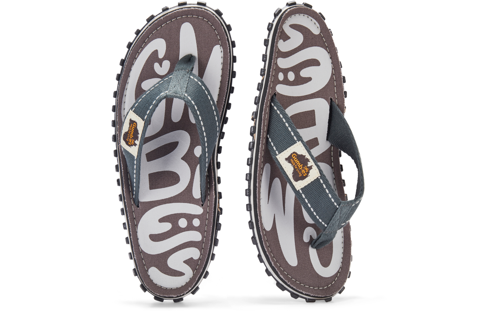 Two flip‑flops side by side, gray straps, brown‑gray footbeds with white abstract pattern, textured rubber soles