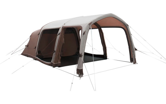 Großes aufblasbares Zelt mit mehreren Eingängen auf grünem Boden