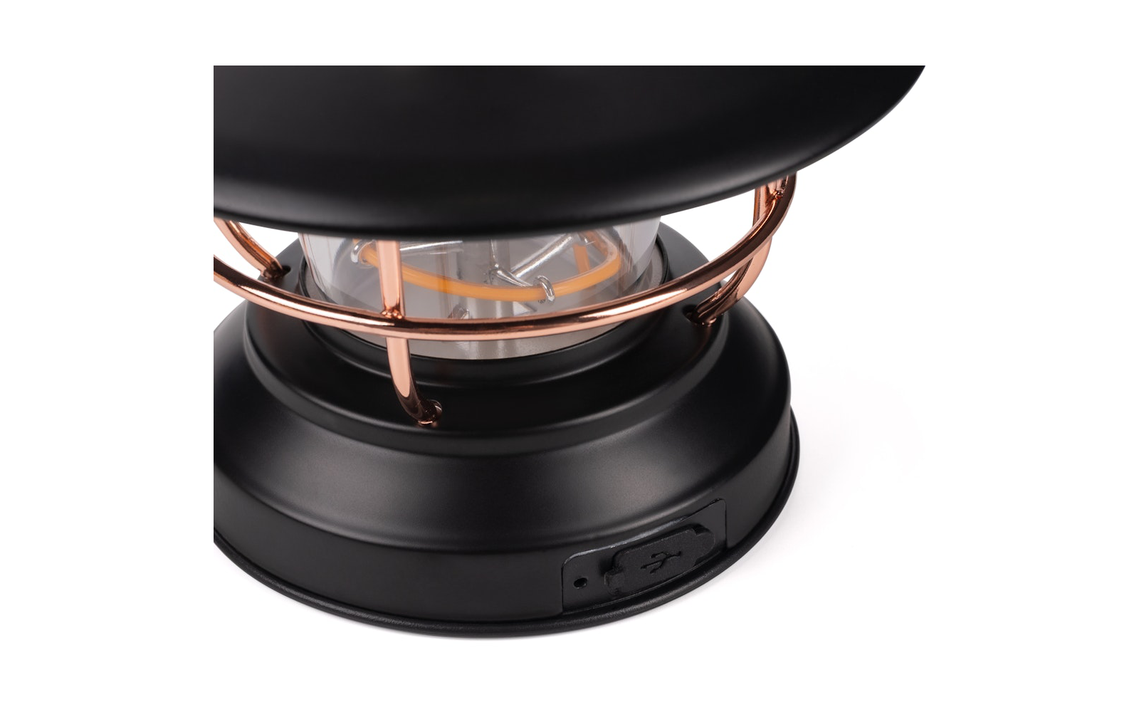 Zwarte ronde metalen voet met USB‑aansluiting, koperkleurige metalen stangen, heldere glazen lamp met zichtbaar gloeidraad, zwarte kaprand