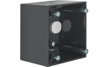 Une boîte d'encastrement en plastique noir avec quatre trous de vis