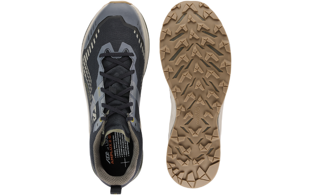 Obere Ansicht eines schwarzen Sportschuhs und Ansicht der Sohle in Braun