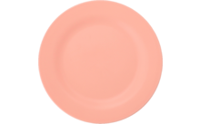 Assiette ronde rose sur fond blanc