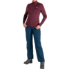 Pull homme bordeaux avec col montant et fermeture éclair, porté par une personne debout en jean bleu et chaussures noires