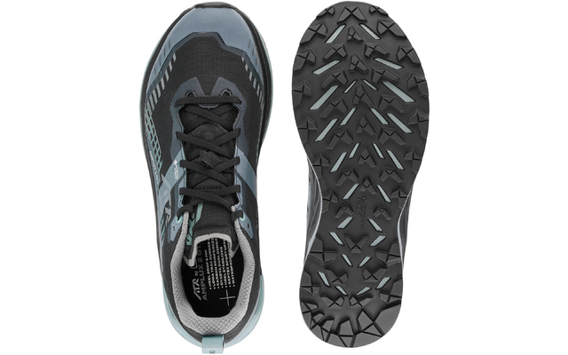 Eine schwarze und graue Sportschuh von oben und unten fotografiert