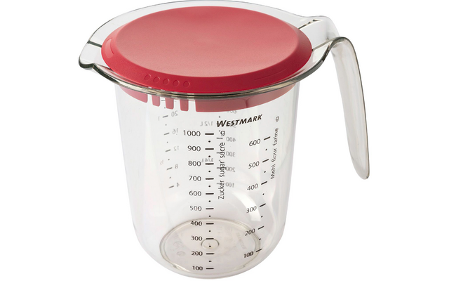 Transparante maatbeker met handvat, schenktuit en rood deksel, zwarte maatverdeling en 'WESTMARK' merknaam