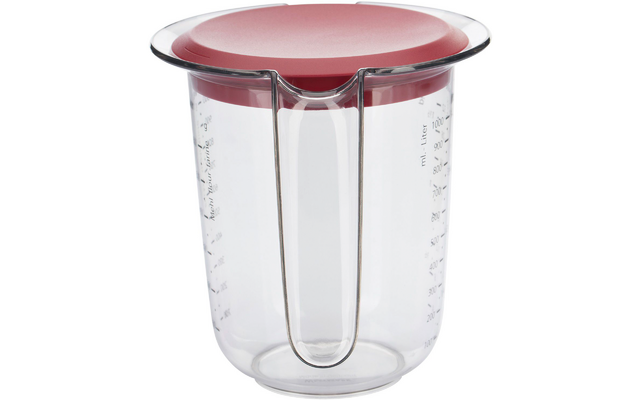 Transparante kunststofbeker met maataanduidingen aan de zijkanten, een holle verticale inzet in het midden en een vlakke roze deksel