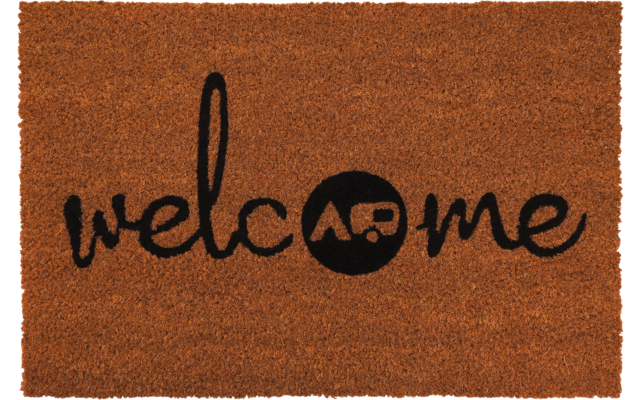 Brauner Fußabtreter mit schwarzem Schriftzug 'welcome' und schwarzem Kreis als 'o' mit Wohnwagen-Symbol