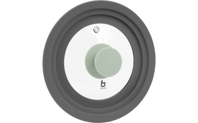 Ronde transparante schijf met grijze siliconenrand, in het midden lichtgroene knop, klein metalen ventiel boven en klein 'b'-logo onder