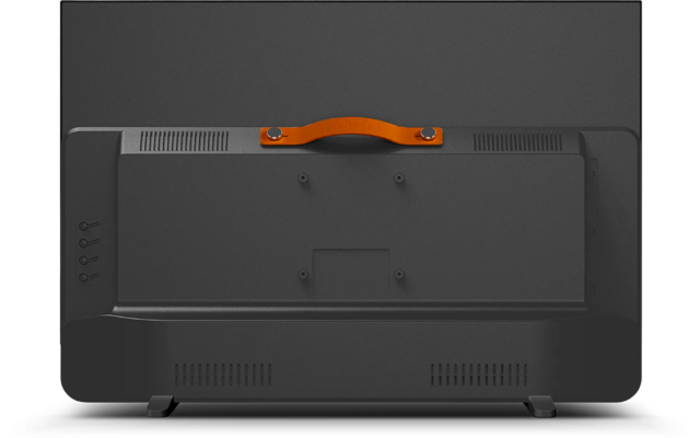 Retro di un monitor scuro con maniglia arancione nella parte superiore, prese d'aria, piastra di montaggio e due piedini