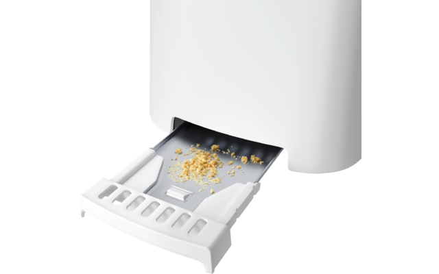 Uitgetrokken kruimellade van een witte broodrooster met kruimels op de lade