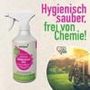 Weiße Sprühflasche mit pink-grünem Etikett und Markenname 'awiwa' links; großer Schriftzug 'Hygienisch sauber, frei von Chemie!' oben rechts; rundes Foto mit Fahrrädern in sonniger Landschaft und kleines rundes Icon mit lächelndem Gesicht; beiger str