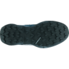Bottom of a shoe sole, dark tread with lugged pattern and a white Salomon logo in the center
