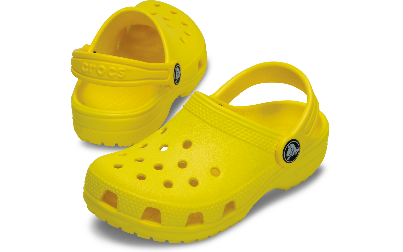 Paire de sabots jaunes avec trous d'aération, brides arrière et logo rond sur le côté