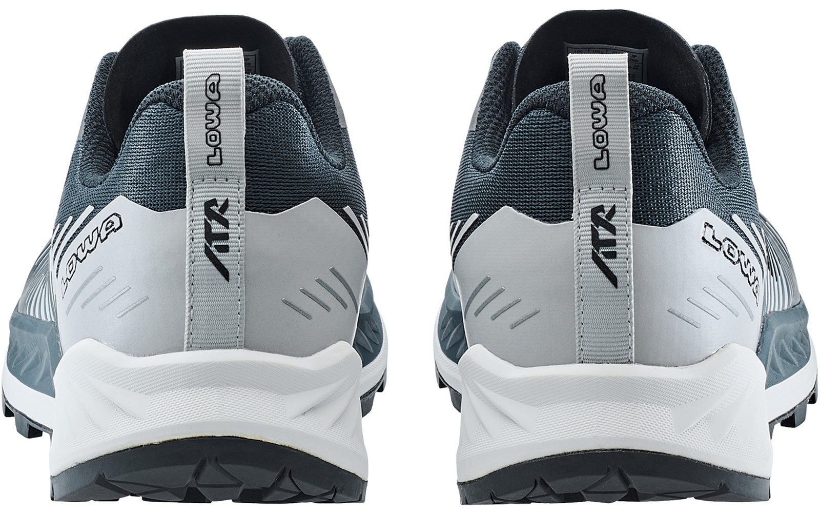 Rückansicht zweier graublauer Sportschuhe mit weißen Sohlen und Zuglaschen