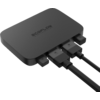 Small black electronic device with multiple connected cables