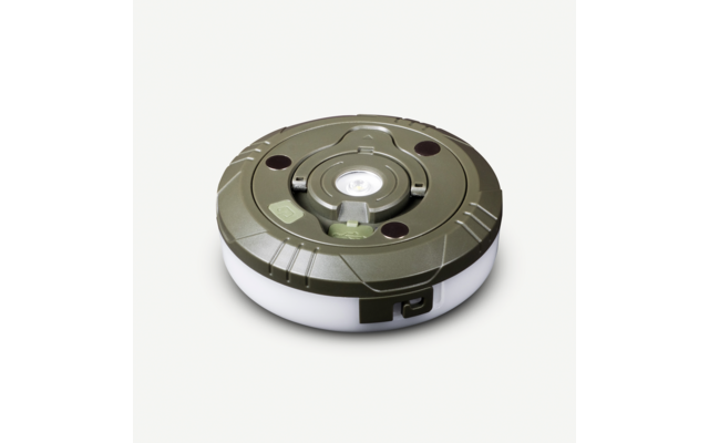 Runder, flacher Gegenstand mit olivgrünem Oberteil, weißem Leuchtring, mittiger runder Lichtquelle, zwei kleinen runden Öffnungen und kleinem Schalter