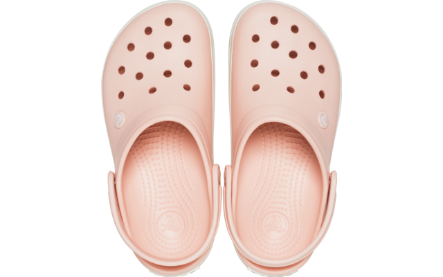 Paar rosa Clogs von oben, mit Belüftungsöffnungen, geriffelter Innensohle und Fersenriemen