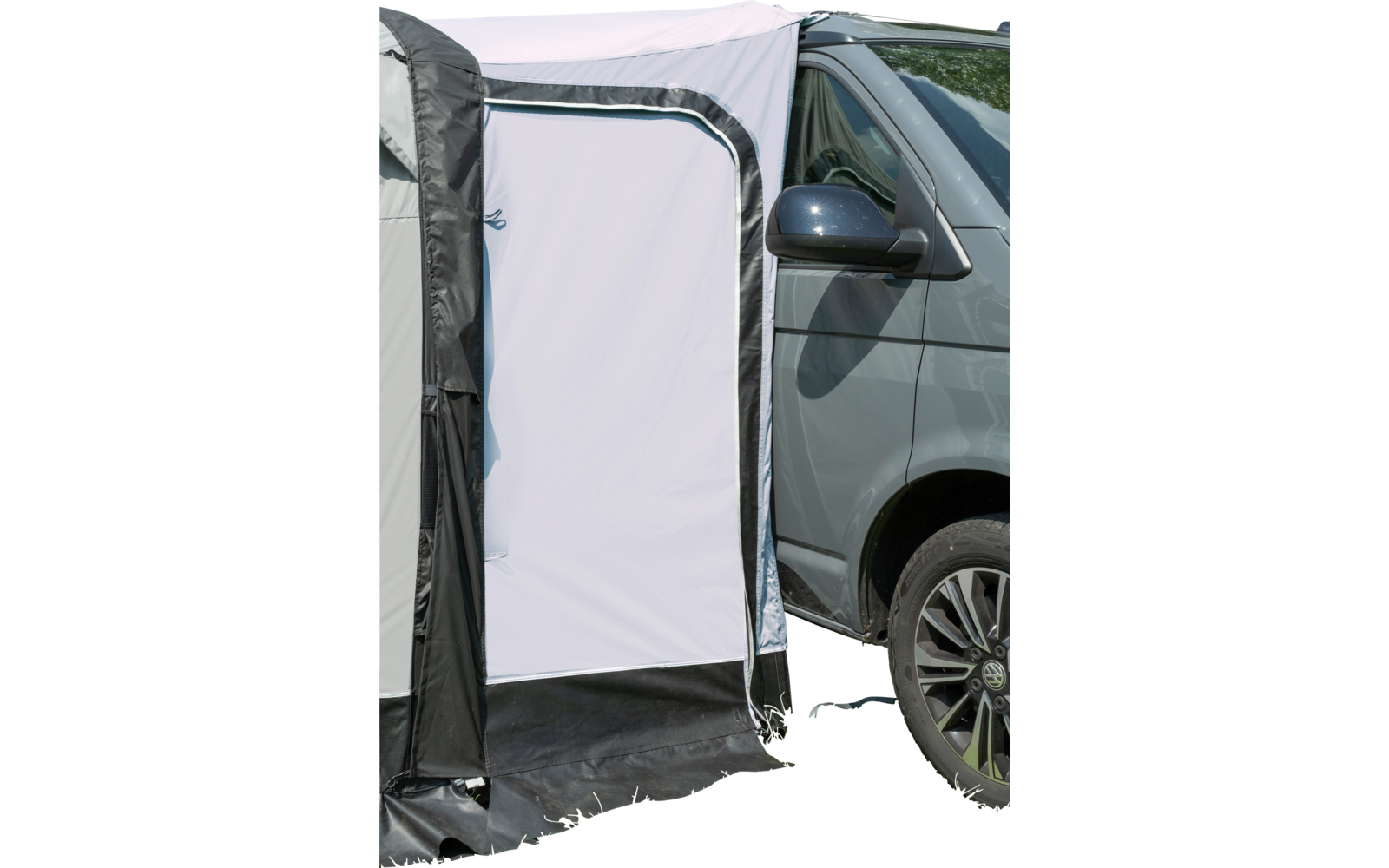 Inflatable windscreen next to grey car on grass