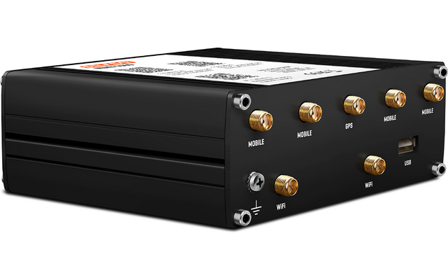 Schwarzes rechteckiges Metallgehäuse mit mehreren goldfarbenen Rundanschlüssen, einem USB‑Port, sichtbaren Schrauben und einem Aufkleber auf der Oberseite