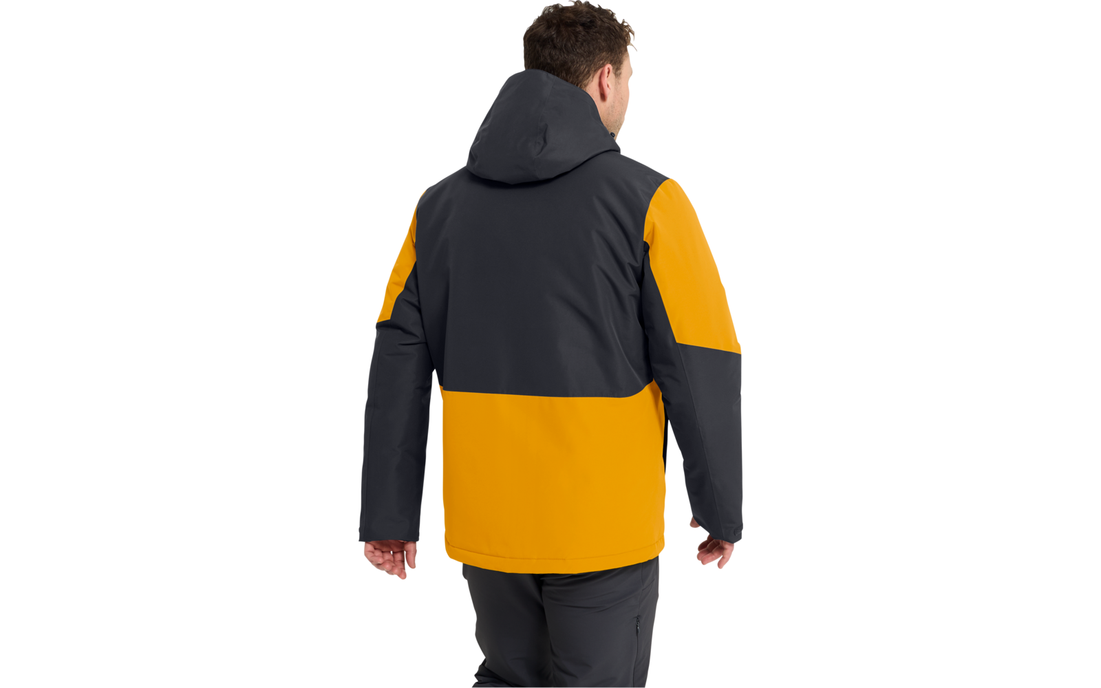 Person von hinten mit kurzer brauner Frisur, trägt zweifarbige Kapuzenjacke (dunkelgrau und gelb) und dunkle Hose