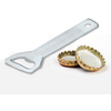 Metal bottle opener with textured handle and two gold bottle caps, one upside down showing white lining, on a white background