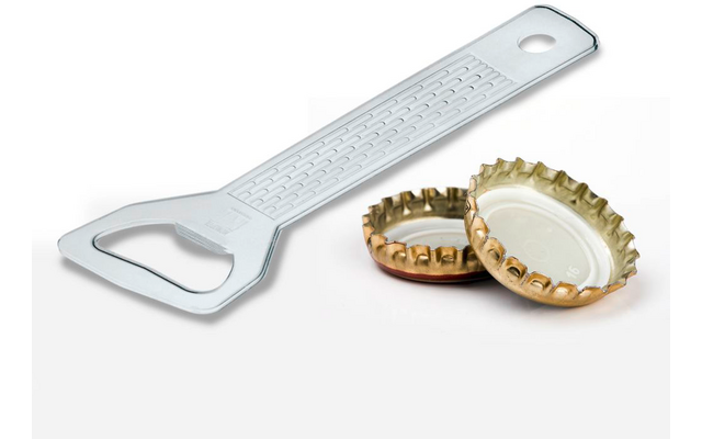 Metal bottle opener with textured handle and two gold bottle caps, one upside down showing white lining, on a white background