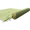 Greenish rolled-up sleeping pad inner section lying on an unrolled sleeping pad on grass