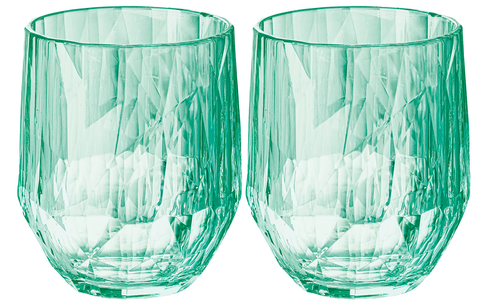 Twee groene facetten glazen zonder inhoud