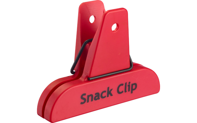 Pinza para snacks roja de plástico con resorte metálico negro, texto 'Snack Clip' en el lateral, fondo blanco