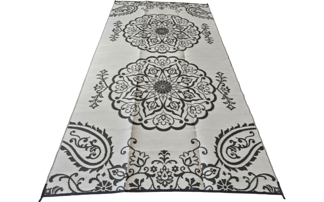 Rechthoekige witte loper met drie grote zwarte cirkelvormige ornamenten in het midden; gebogen zwarte motieven aan beide uiteinden en een zwarte rand